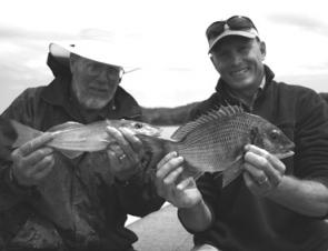 Bream and whiting are great species to target during February. Here Adam and Bucky display a pair of quality fish caught on plastics.